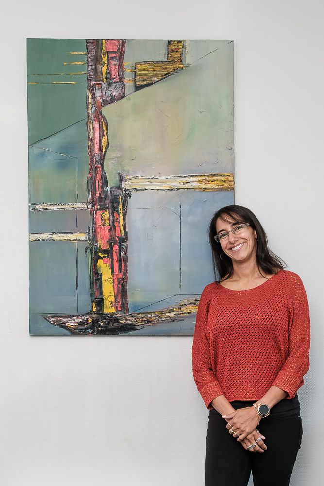 Carolina Lara standing in her office